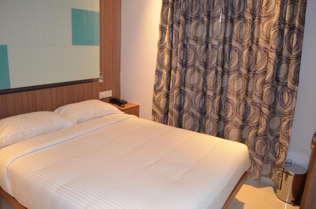 FabHotel Hiland Suites Bangalore Kamer foto